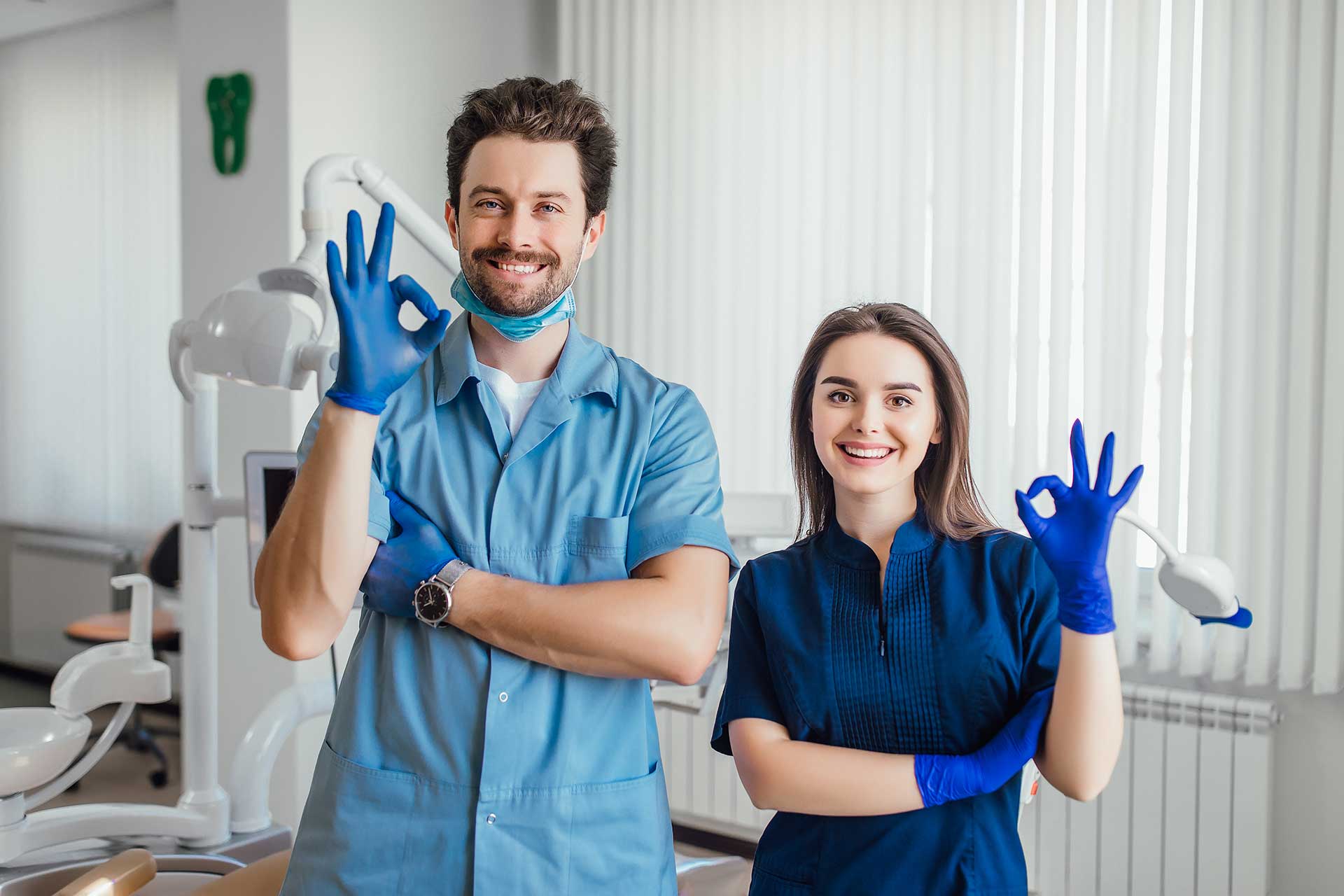Smiling dental professionals at Dentique Dublin clinic, showcasing compassionate and high-quality dental care